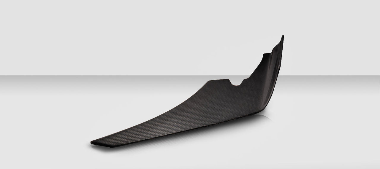 Carbon fiber car spoiler on a white background