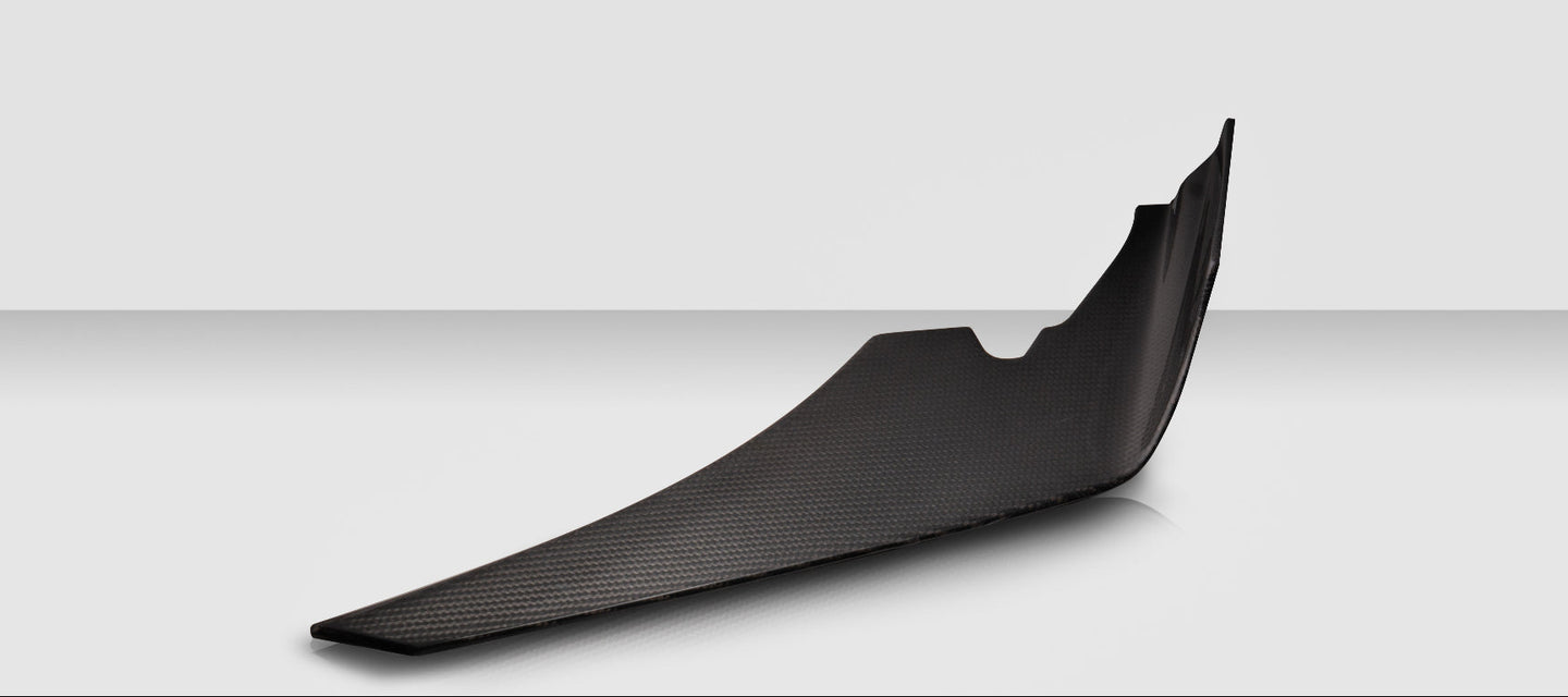 Carbon fiber car spoiler on a white background
